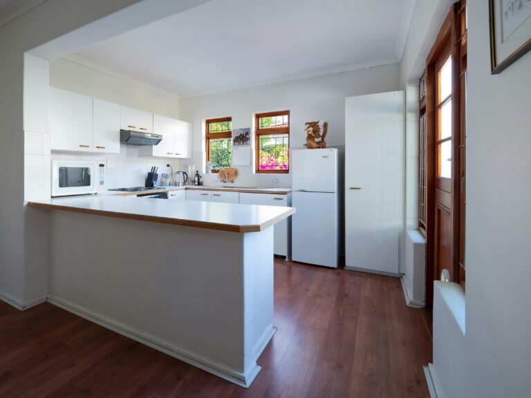 brow countertops with white cabinets